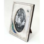 A silver photograph frame with enamel sailing boat decoration. 21stC.