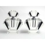A pair of art deco style clear and black glass scent/perfume bottles. 21st C.