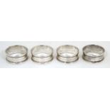 A cased set of 4 silver napkin rings hallmarked Birmingham 1973/74 maker Henry Griffith & Sons Ltd