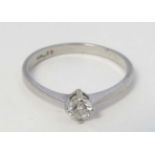 A platinum diamond solitaire ring ( diamond approx .