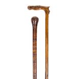 *Walking Stick. A Greek walking stick, circa 1900, carved from olivewood the handle carved with a