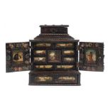 *Table Cabinet. A 17th century Dutch table cabinet, tortoiseshell effect on pine, the top with