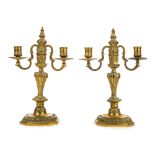 *Candlesticks. A pair of French candleabra, circa 1830s, each with detachable twin branch, cast with