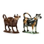 *Creamer. An early 19th century Pearlware cow creamer with a mottled brown and black glaze, modelled