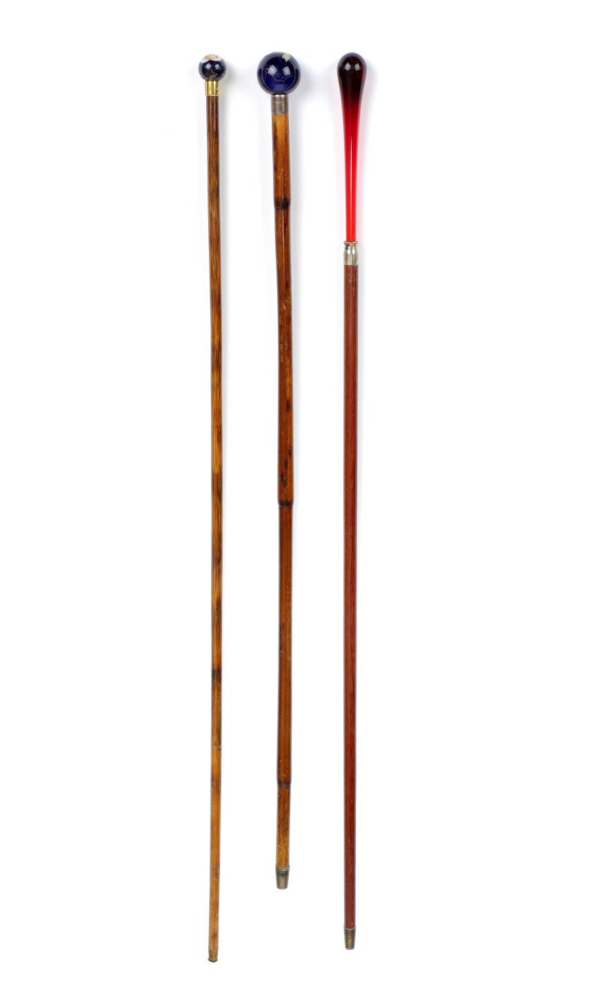 *Walking Canes. A Victorian ladies walking cane, with spherical porcelain knop in blue with gilt and - Image 2 of 4