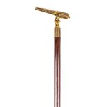 *Walking Cane. A late 19th century "Cheroot Gun" cane, the brass handle modelled as an old cannon on