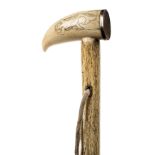 *Walking Cane. A 19th century walking stick, with substantial spiral carved whalebone shaft with