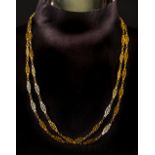 *Gold Chain. A gold chain, with pierced links, the clasp stamped 750, 68 cm drop, 5.2 g (1)