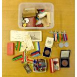 *Mixed Medals. A mixed collection of military medals, badges, buttons, etc, including a cased bronze