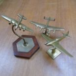 *Desktop models. A brass Aircraft model of a Comet, 19cm wingspan, together with Lancaster bomber,