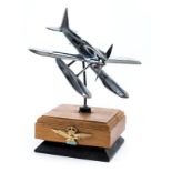 *Schneider Trophy. A 1927 car mascot of the Supermarine S6, in chrome with red, white and blue