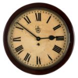 *RAF Clock. A WWII 1943 RAF station wall clock, the circular white enamel dial with black roman