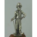 *Charlie Chaplin. A well-detailed, petit mascot, with its original nickel-plating and walking stick,
