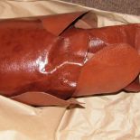 *Leather. Approximately thirty skins of burnished brown 'Ganges' calfskin leather, mostly whole