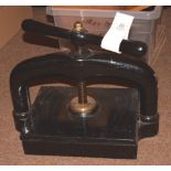 *Bookpress. A small cast iron bookpress, finished in black, platen approximately 30 x 25cm (12 x