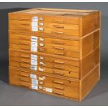 *Plan chest Pine plan chest with twelve drawers, 20th century, stained pine plan chest in four parts