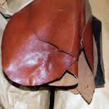 *Leather. Approximately thirty skins of burnished brown 'Ganges' calfskin leather, mostly whole