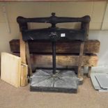 *Nipping press. A cast iron nipping press, finished in black and with cast iron lion emblem motif in