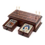 *Cribbage. A Victorian wooden cribbage box, mahogany box with inlaid top and two drawers, 125 x