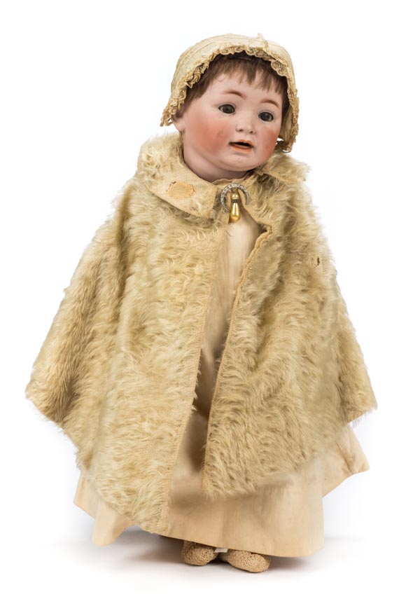 *Doll. A bisque head doll, Continental, circa 1910, composition character doll with articulated