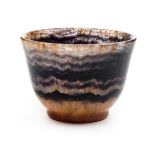 *Blue John. A 19th century Derbyshire Blue John bowl, with fine amethyst banding, 6.5cm diameter x