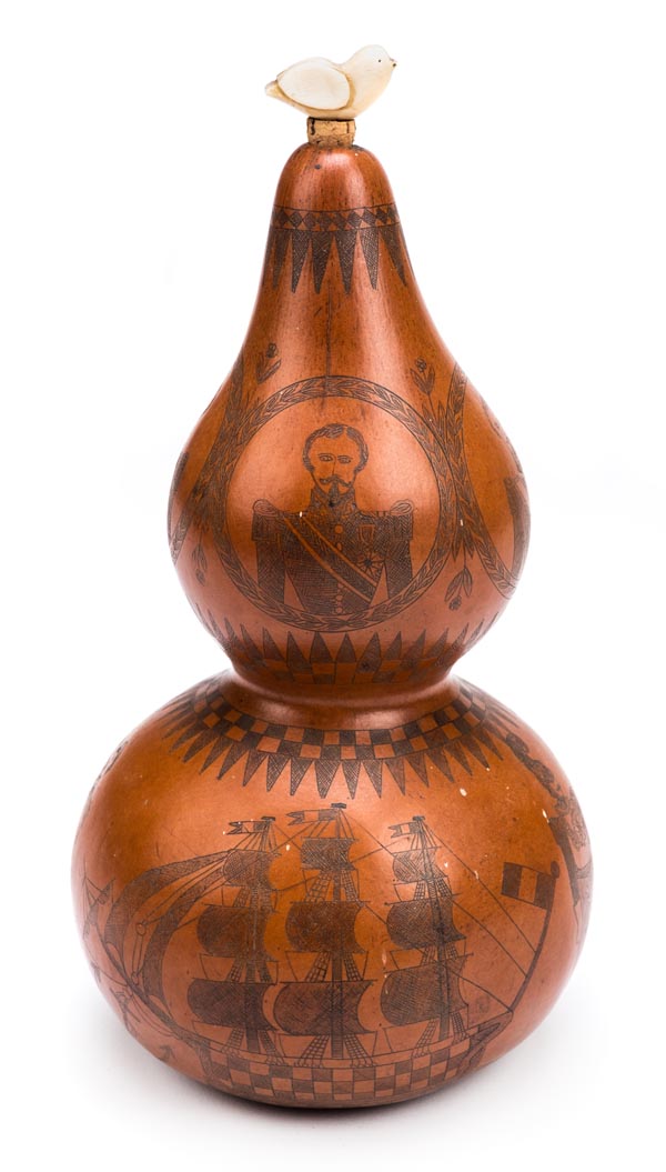 *Gourd. A 19th century French double gourd with scrimshaw decoration, the top section with portraits