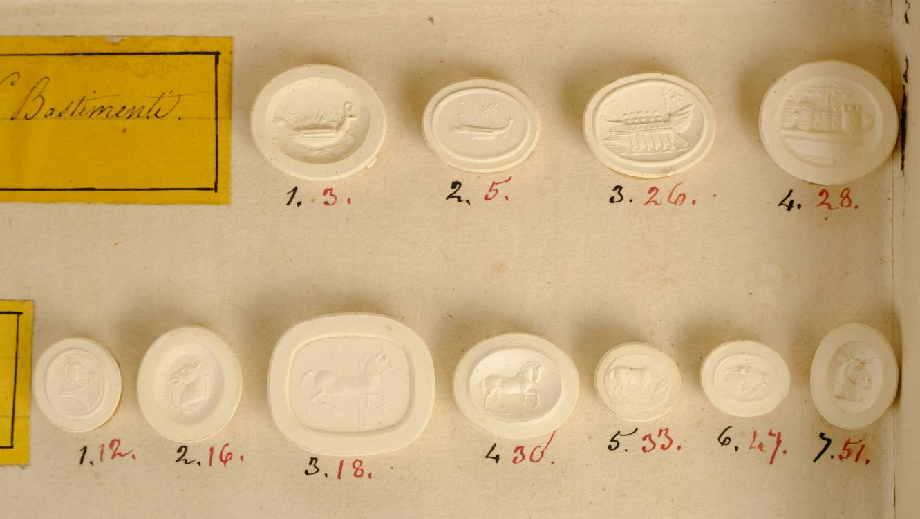 *Grand Tour. A 19th century book form box, containing 138 classical plaster seals, Impronte Gemmarie - Image 6 of 6