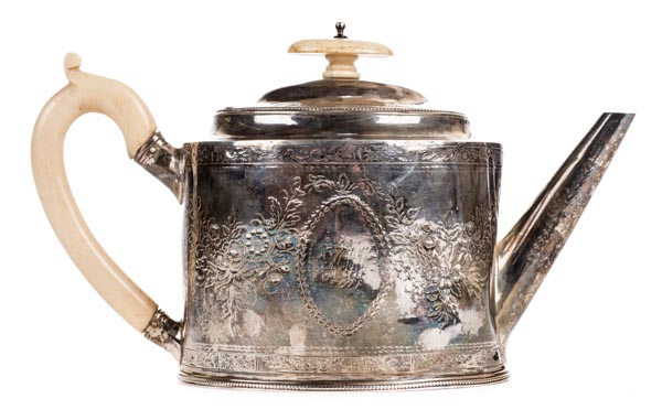 *Teapot. A George III silver drum shape teapot by Hester Bateman London, 1787, with ivory finial and