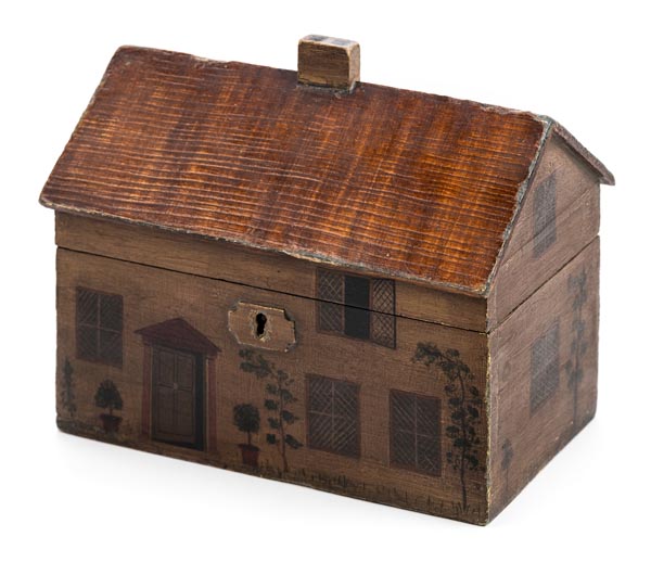 *Tea Caddy. A 19th century tea caddy in the form of a cottage, painted finish and tin lining, 18cm