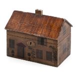 *Tea Caddy. A 19th century tea caddy in the form of a cottage, painted finish and tin lining, 18cm