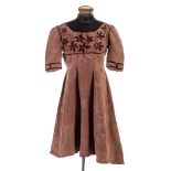 *Dress. An Art Nouveau dress, circa 1910, hand and machine-sewn terracotta moir‚ silk dress, with