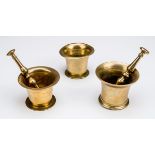 *Pestle and Mortar. Three 18th century bronze mortars and two pestles, the mortars all plain with