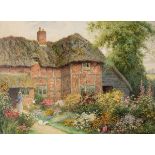 *Strachan (Arthur Claude, 1865-1938 ). Cottage Garden, watercolour on board, signed lower right,