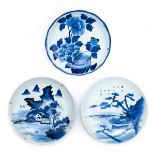 *Charger. A Japanese blue and white porcelain charger, decorated with pagodas and pine trees