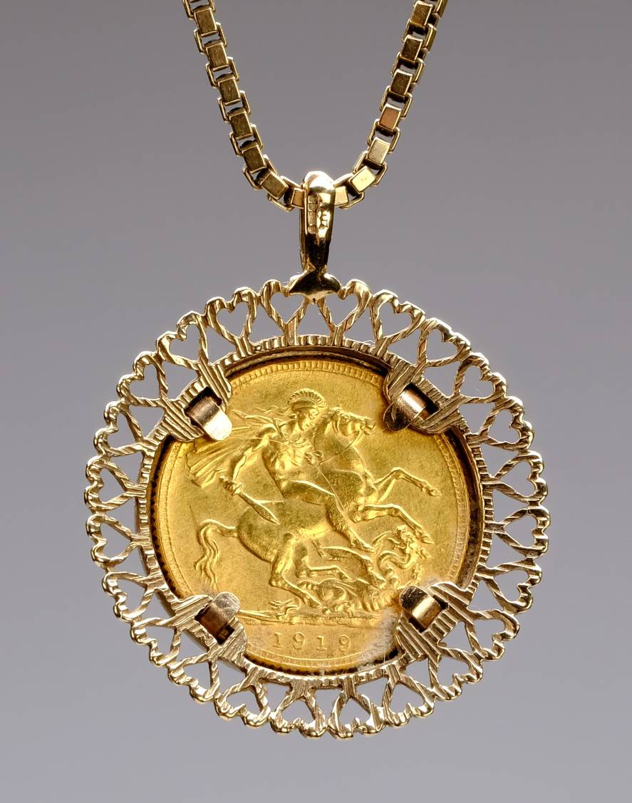 *Sovereign. A George V gold sovereign, 1919, mounted in a 9ct gold pendant with box link chain, - Image 2 of 3