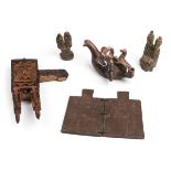 *Tribal. An African carved wood Dogon lock, with geometrical carving, 24cm long, together with two