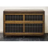 *Bookcase. An Edwardian two section bookcase, stained two shelf wooden bookcase with two glass