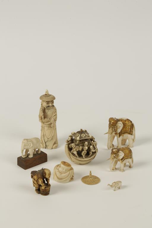 A GROUP OF CHINESE, JAPANESE AND INDIAN SMALL DECORATIVE IVORIES, circa 1890-1920, including a