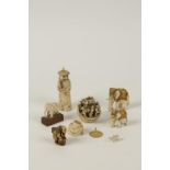 A GROUP OF CHINESE, JAPANESE AND INDIAN SMALL DECORATIVE IVORIES, circa 1890-1920, including a