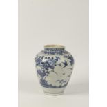 A JAPANESE ARITA BLUE AND WHITE PORCELAIN BALUSTER VASE decorated with birds in flight amongst large