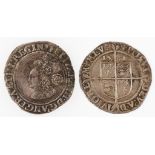 ELIZABETH I. SIXPENCE, 1561. Obv: Smaller bust left, rose behind. Rev: Square topped shield below