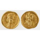 HONORIUS, 393-423 AD. AV SOLIDUS. Obv: Facing cuirassed bust holding a shield and spear. Rev: