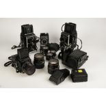 A ZENZA BRONICA SQ-A CAMERA, a Zenza Bronica SQ-AM Camera, two Mamiya C330 Professional f twin