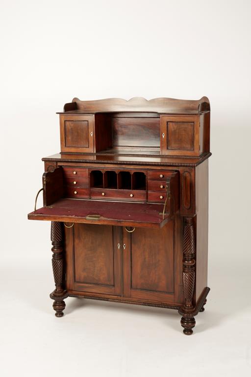 A REGENCY MAHOGANY SECRETAIRE CHIFFONIER, the upper section with a shaped frieze above a central - Image 2 of 2