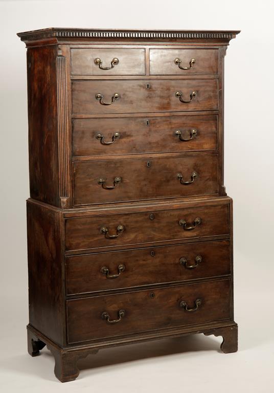 A GEORGE III MAHOGANY CHEST ON CHEST, the upper section with a dentil moulded cornice above two