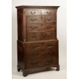 A GEORGE III MAHOGANY CHEST ON CHEST, the upper section with a dentil moulded cornice above two