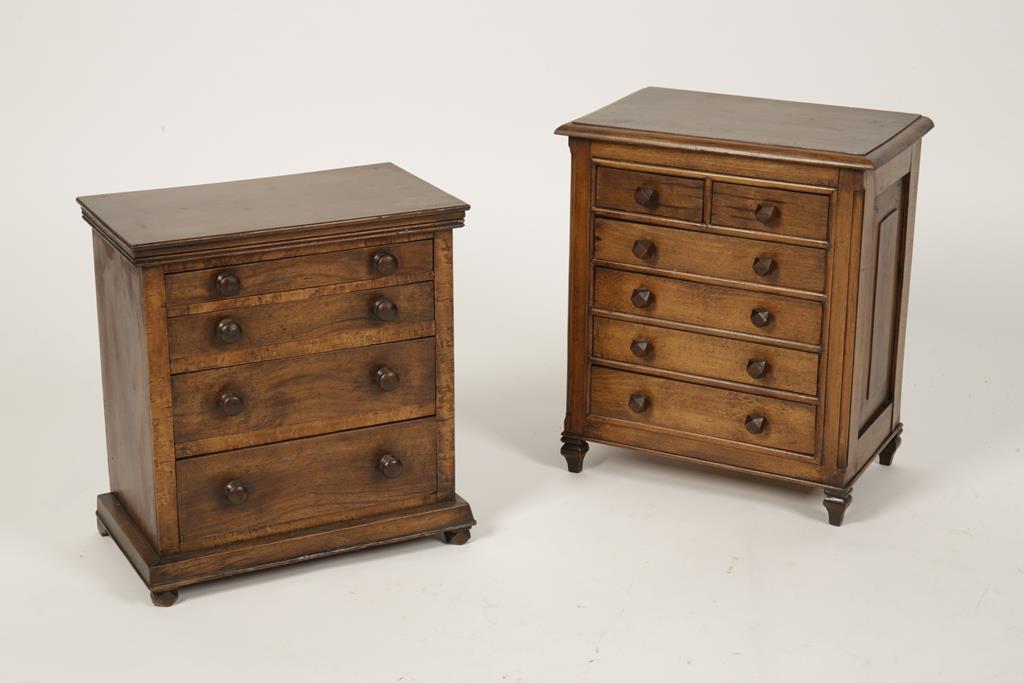 A VICTORIAN STYLE MINIATURE CHEST OF DRAWERS with rectangular top above four graduated drawers