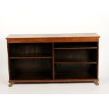 A REGENCY ROSEWOOD OPEN FRONTED BOOKCASE, the rectangular top above a shallow frieze above open