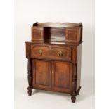 A REGENCY MAHOGANY SECRETAIRE CHIFFONIER, the upper section with a shaped frieze above a central