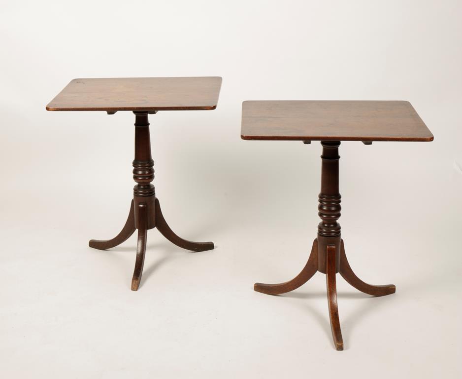 A PAIR OF REGENCY MAHOGANY OCCASIONAL TABLES, the rectangular tip-tops with rounded corners, on